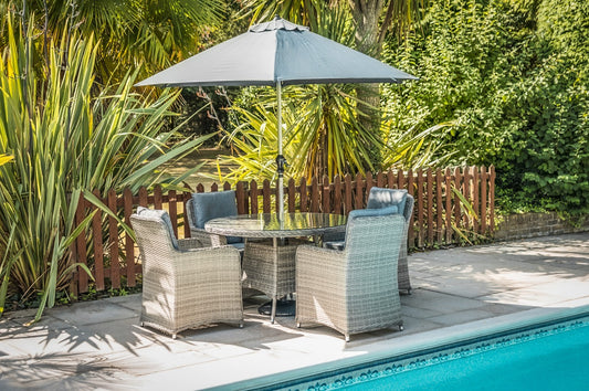 Katie Blake  Milan 4 Rattan Garden Dining Chairs & Round Table Set